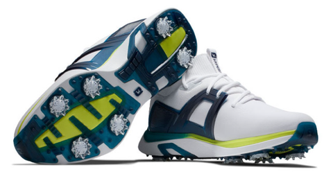 A pair of FootJoy Men's Hyperflex Golf Shoes in White/Lime/Navy displays the spiked sole for traction and all-day golf comfort. One athletic shoe stands upright, while the other showcases the detailed sole design and spikes.