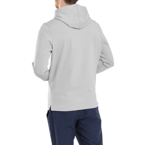 A person with short hair is shown from the back, wearing a grey FootJoy Men's Ottoman Jacquard Pullover Hoodie and dark blue athletic-fit pants, standing against a white background.