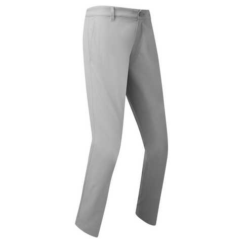 The FootJoy Mens Par Trousers are light gray, slim-fit pants with belt loops, button and zipper closure, side pockets, and moisture-wicking fabric, shown against a white background.