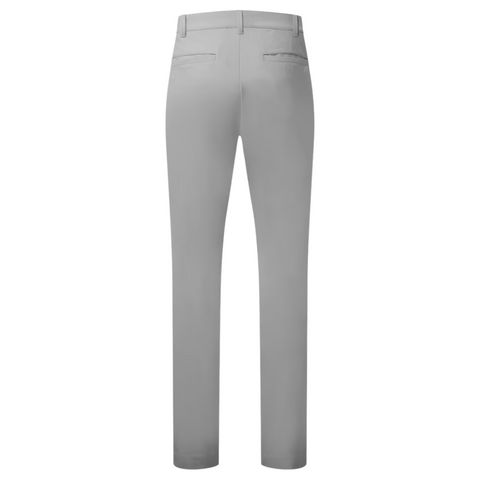 Back view of FootJoy Mens Par Trousers in light gray, featuring belt loops, two welt pockets, and a slim-fit design. These golf trousers offer moisture-wicking comfort, shown on a white background. Brand: FootJoy.