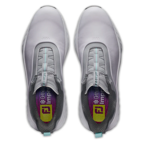Top-down view of FootJoy Men's Quantum Boa Golf Shoes in White/Grey/Teal, featuring gray accents, teal pull tabs, and branded insoles for a precision fit in a spikeless design.
