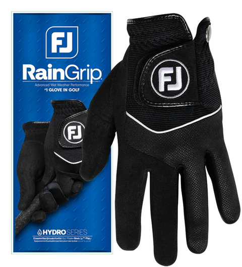 The FootJoy Men's RainGrip Golf Glove in black with white accents and FJ branding is shown before its blue packaging, emphasizing its quick-dry, all-weather performance and HYDRO SERIES label.