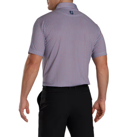 A man is seen from the back in a FootJoy Men's Scallop Shell Foulard Lisle Polo with a small FJ logo by the collar and black pants. The short-sleeve, moisture-wicking polo keeps his arms relaxed at his sides against a white background.