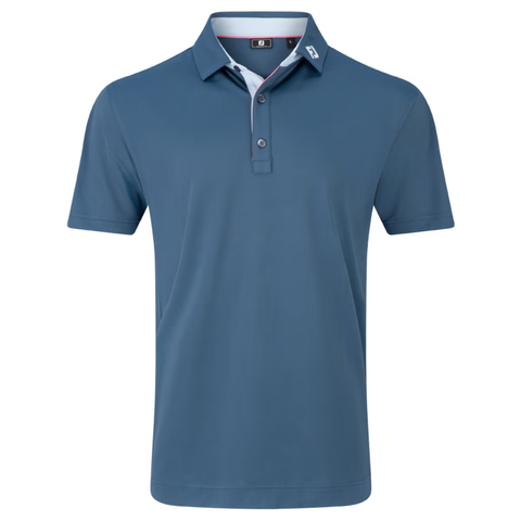 The FootJoy Men's Solid Pique with Trim Polo in Dark Denim/Skyway is a short-sleeved, performance pique golf shirt featuring a collar with three buttons, a small white logo on the left collar tip, and subtle white/red inner collar accents.