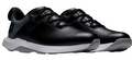 The FootJoy Prolite Mens Golf Shoes in black feature white soles, black laces, and a gray heel accent—stylish and comfortable spikeless golf shoes from FootJoy, ideal for on-course performance. Displayed on a white background.
