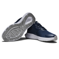 FootJoy QMotion women's golf shoes in Navy/Navy/White – upper and outsole view