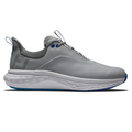 The FootJoy Quantum Men’s Golf Shoes feature a gray upper with white cushioned sole, blue accents on the lace holes and outsole, a heel loop, subtle logo, and mixed materials for all-day comfort inspired by classic spikeless golf shoe design.