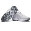 A pair of FootJoy Tour Rival Womens Golf Shoes in white with gray soles and removable spikes for traction; one shoe stands upright showing the side and laces, while the other lies on its side displaying the sole and spikes.