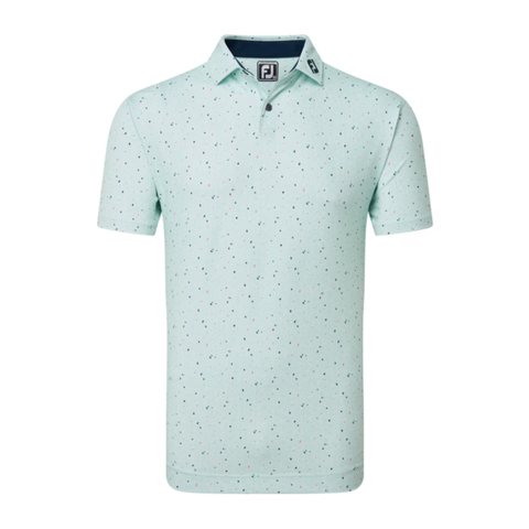 FootJoy Tweed Texture Polo in light mint green. The polo features a subtle tweed-like pattern with small specks of darker colors throughout the fabric. It has a classic button-up collar and short sleeves, with the FootJoy logo on the inside of the collar.