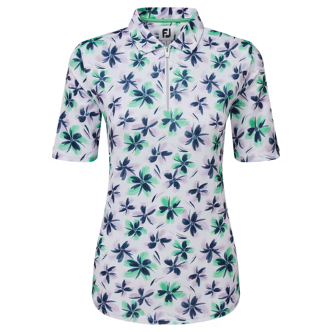 The FootJoy Women's 1/4 Zip Short Sleeve Floral Shirt features a white base with blue and green floral print, zip neckline, inner collar FJ logo, and moisture-wicking fabric for all-day comfort on the course.