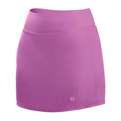 The FootJoy Women's Aerial Performance Knit Skort in Berry features a wide waistband and subtle FJ logo near the hem. This lightweight, stylish skort is shown on a white background.