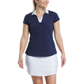 A woman wears the FootJoy Women’s Cap Sleeve Print Shirt in Navy/Skyway and a white skirt, smiling with her head turned slightly to the side against a white background.