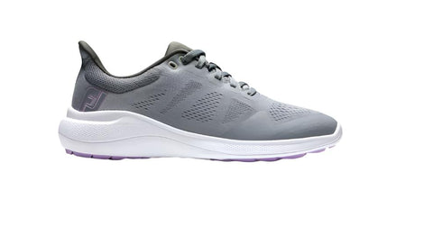 The FootJoy Women's Flex Golf Shoes in grey, featuring a white sole and light purple accents, are displayed in a side profile view against a plain white background.