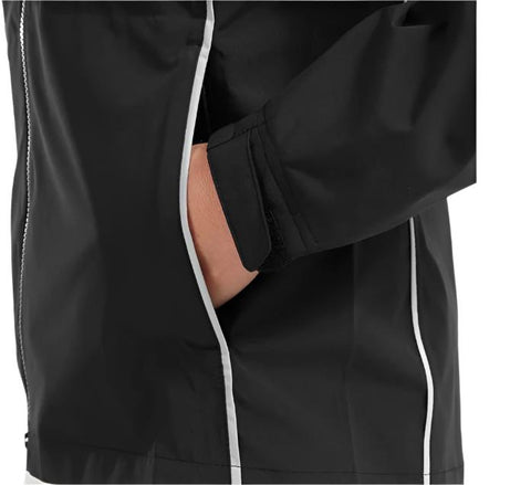 A person is wearing a FootJoy Women's Hydrolite V2 Rain Jacket in black with white piping, their hand tucked into a side pocket.