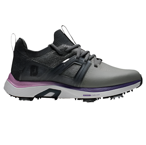 The FootJoy Women’s HyperFlex Golf Shoes in Grey/Pink (US 9 only) offer performance golf footwear with a spiked tread and heel pull tab, ideal for outdoor sports.
