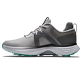 The FootJoy Women's Hyperflex Golf Shoes in Grey/Teal feature black accents, a white midsole, teal-tipped outsole, and white laces. These lightweight, breathable golf shoes are shown in side profile on a white background.