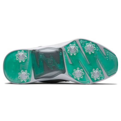 The image shows the bottom view of FootJoy Women's Hyperflex Golf Shoes in grey/teal, featuring a green and white sole with six clear, star-shaped cleats for traction.