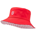 FootJoy red bucket hat with a white logo on the front. The hat is lined with a contrasting red and white checkered pattern, offering both a reversible style and sun protection.