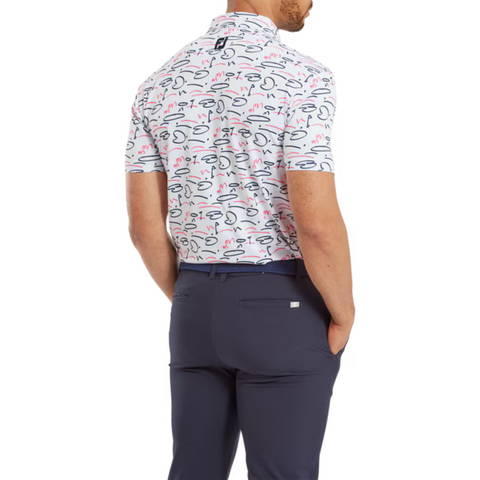 A model shown from the back, wearing the FootJoy Golf Course Doodle Polo. The white polo features a playful navy and red doodle pattern, paired with dark navy pants.