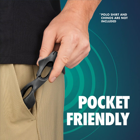 A hand places the compact black Golf-Grip Training Aid by Golf-Grip into tan chinos. Text says POCKET FRIENDLY and states, POLO SHIRT AND CHINOS NOT INCLUDED. The background is blue with circular graphics.