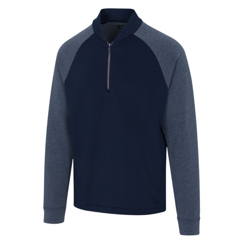 The Greg Norman Mens Eagle Tech Quarter Zip Long Sleeve Top features a navy body, heathered blue sleeves, zip-up collar, ribbed cuffs, and moisture-wicking fabric for casual athletic style.