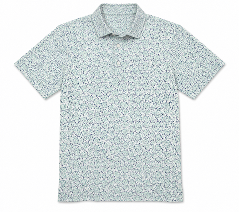 Greg Norman men's golf polo with mint, aqua and navy starburst print, front view