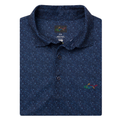The Greg Norman Men's ML75 Club House Print Polo in navy features a subtle geometric pattern, three-button placket, moisture-wicking ML75 recycled fabric, and an embroidered multicolored shark logo on the chest.