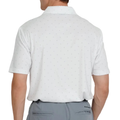 Man wearing the Levelwear Inlay white golf polo, back view
