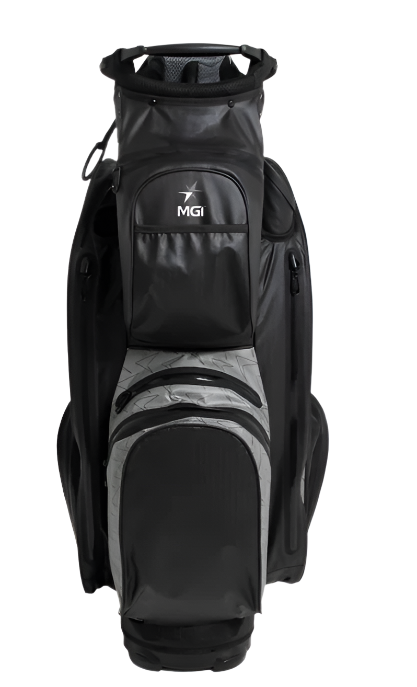 The MGI 2024 Dri Play Cart Bag, in black, features multiple zippered compartments, the MGI logo on the front pocket, and a lightweight waterproof design. It stands upright against a white background.