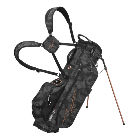 The Mizuno 2024 BR-D3 Stand Bag features a black and gray camo design, orange accents, dual shoulder straps, multiple zippered pockets, and two extendable legs—offering lightweight style and function for the golf course.
