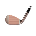 A close-up of the Mizuno 2025 Pro T-1 Denim Copper Wedge highlights its precision-grooved face for spin and a metallic denim copper finish, set against a white background.