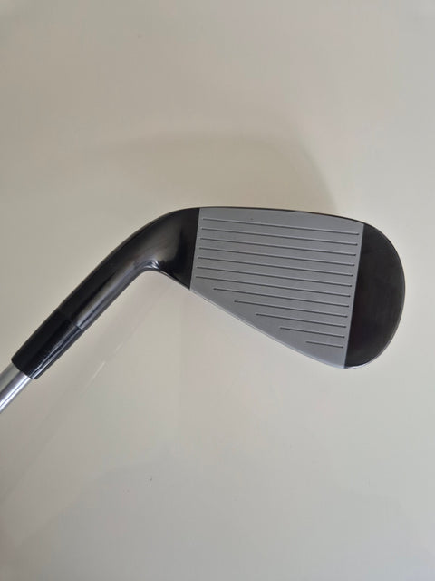 Mizuno Pro Fli-Hi 4 driving iron clubface showing minimal use