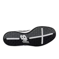 The image shows the black outsole of the New Balance 480 Golf SL Mens Golf Shoes - Black/White, featuring a white NB logo, raised hexagonal pattern, and white lines on the forefoot and heel for traction.