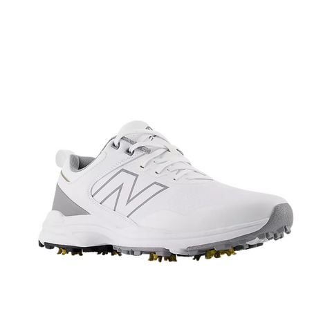 The New Balance Brighton V2 Mens Golf Shoe in white/grey features gray accents, a large N logo, textured sole with yellow spikes for traction, and is waterproof—ideal for golf.