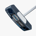 A close-up of the Odyssey Ai-ONE Square 2 Square Double Wide Cruiser Putter head by Odyssey shows a blue and black design with metallic accents, an AI-designed insert, and “A.I.-ONE” plus “Square to Square” on its face.