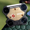 Odyssey TRTL Crank Hosel putter sole, showing the gold plate and four corner weights