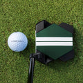Odyssey TRTL Crank Hosel putter at address on grass beside a golf ball