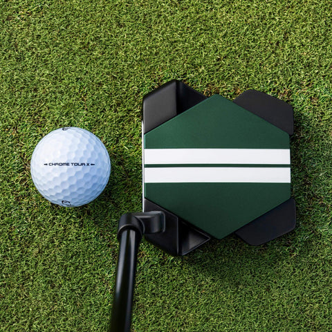 Odyssey TRTL Crank Hosel putter at address on grass beside a golf ball