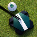 Odyssey TRTL Max Square 2 Square putter at address beside a ball on the green