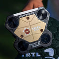 Odyssey TRTL Max Square 2 Square sole and four corner weights photographed above its headcover