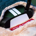 Odyssey TRTL Slant Neck putter face and Ai-Star insert resting in the lined headcover