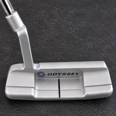 Used Odyssey White Hot OG 1WS 33 inch right-handed putter on charcoal workbench