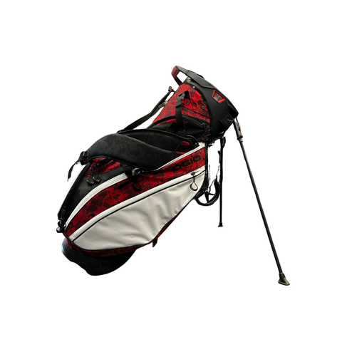 The Ogio 2026 Silencer Hybrid Bag in Volcanic features multiple zippered pockets, enhanced club security, and an extended stand, shown on a white background.