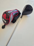 Angled crown view of the PGF Status SP1 women's 7 wood and included PGF headcover
