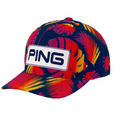 The PING 2025 Hawaii Collection Electric Sunset Tour Snapback by Ping features a bold red, yellow, and orange tropical leaf print with a white front patch displaying PING in black letters.