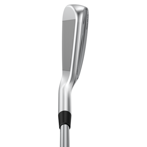 A close-up of the Ping 2025 iDi Driving Irons highlights the grooved clubface and shaft, presenting this silver club as a top long-iron alternative against a white background.