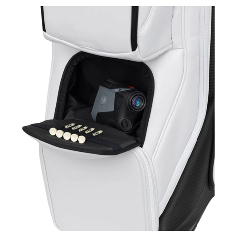 A close-up of the Ping 2026 DLX 244 Cart Golf Bag | White shows an open pocket revealing a camera and neatly arranged golf tees on the flap.