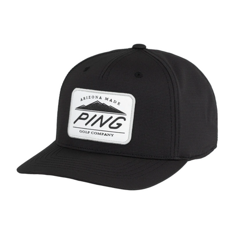 The PING Camelback Patch Cap by Ping is a black, flat-brim golf cap with a white Arizona Made PING Golf Company patch on the front and moisture-wicking fabric for all-day comfort.