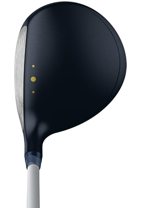 A close-up of the PING G Le3 Women's Fairway Wood by Ping shows its black, metallic club head with two small yellow dots and one larger yellow dot near the face, attached to a lightweight white shaft.