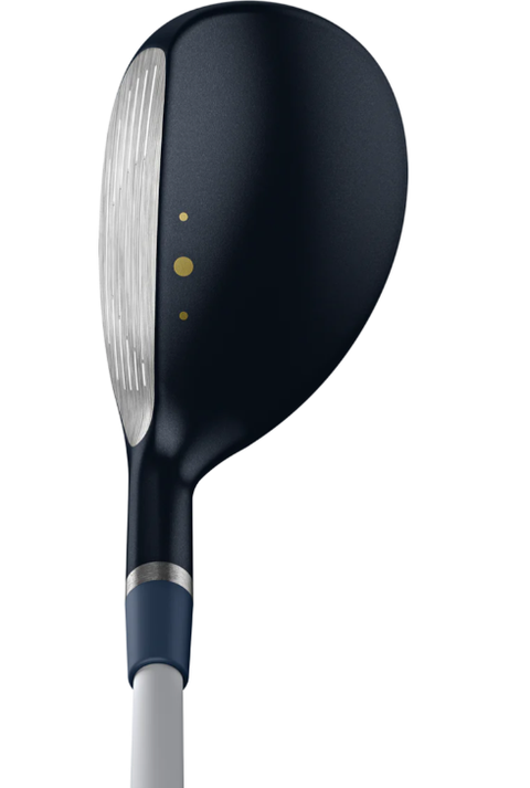 A close-up of the Ping G Le3 Women's Hybrid shows its forgiving face technology, dark blue crown with two gold alignment dots, and a sleek silver-blue shaft.